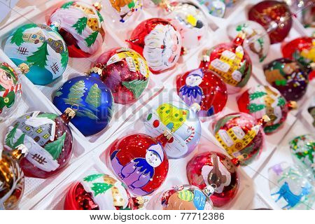 STRASSBOURG - DECEMBER 23: Colorful decorations on the Christmas market in Strasbourg on December 23, 2013 in Strasbourg, France. Christmas market is famous tourist attraction of the city.