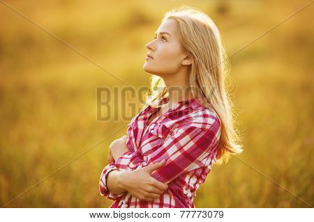 Beautiful Blond Girl In Shirt Looking Up