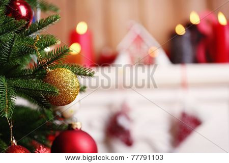 Fireplace with beautiful Christmas decorations in room