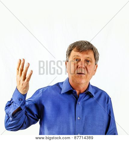 Portrait Of A Senior Man Standing On White Background Showing That He Has A Problem To Solve