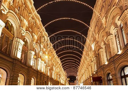 Holiday Illumination In The Form Of An Arch On An Ancient Building