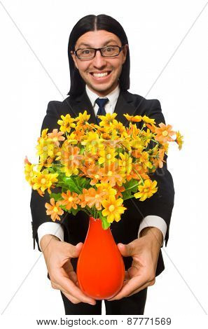 Handsome businessman with flower pot isolated on white
