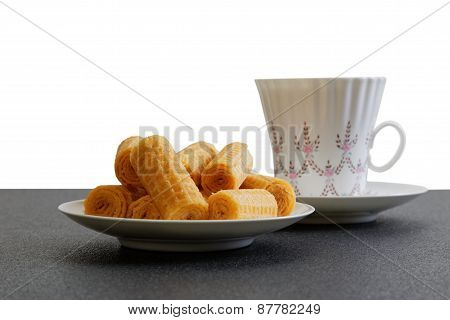 Waffer Rolls And Cup Of China Tea