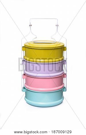 Colorful tiffin food carrier isolate on white background
Tiffin or food carrier is a kind of container for food to go outside, mostly used in the Southeast Asian countryside, such as Thailand, Laos etc.  Buddhists often use this container to put food to m