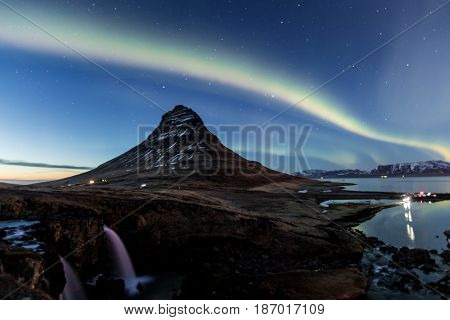 Northern Light Aurora Borealis At Kirkjufell Iceland With Fully Start In The Sky