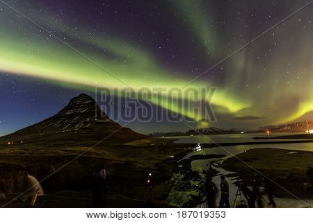 Northern Light Aurora Borealis At Kirkjufell Iceland With Fully Start In The Sky