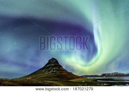 Northern Light Aurora Borealis At Kirkjufell Iceland With Fully Start In The Sky