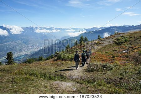 tourist walking in trekking trail with Beautiful view in Nendaz Switzerland