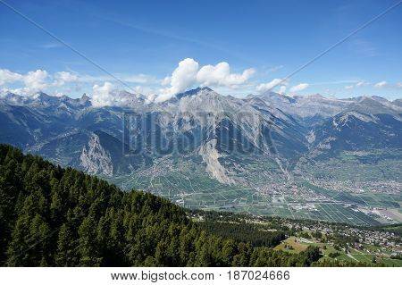Nice view along trekking trial with the Alps in background in Nendaz, Switzerland