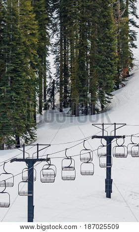 Empty ski lift on a snowy day