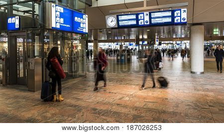 Rotterdam The Netherlands - March 10 2017: Travelers walking in the hall of the railway station of Rotterdam in the Netherlands.