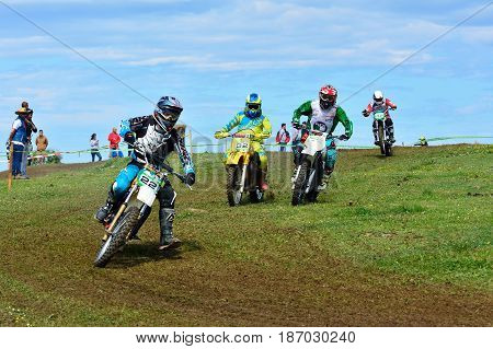 Unidentified Racer Rides A Classic Motorcycle.