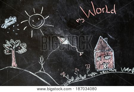 Chalk Drawing Of House And Sun On A Black Background,