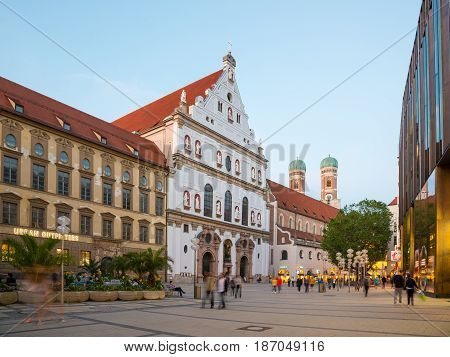 Munich, Germany - June 6, 2016: Neuhauser Street in Munich at the sunset, Germany