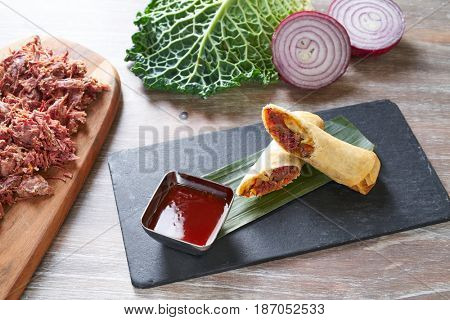 Duck rolls with sweet and sour sauce Asian cuisine recipe