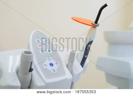 Dental UV curing light lamp . Ultraviolet polymerization Light Tool With Orange blocking glass. tooth care concept