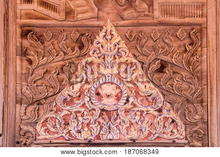 Wood carving antique Wat Guti Bangkem Thailand