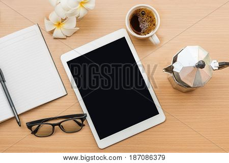 top view office with wooden table and laying on it with coffie