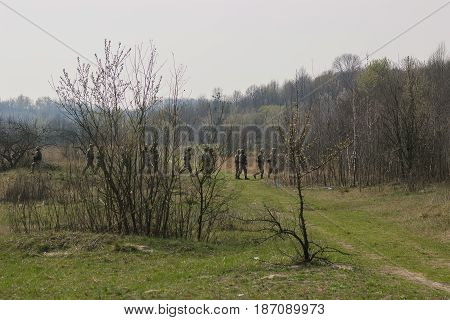 Military soldiers at tactical exercises with guns