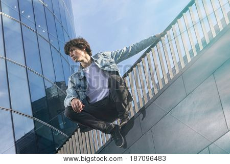 Young Man Doing Parkour In The City