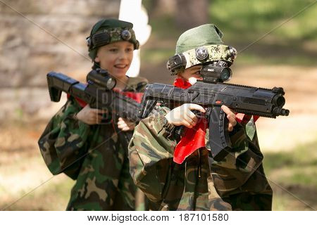 Gomel, Belarus - May 15, 2017: Children And Adults Play The Collective Game Lasertag In The Open Air