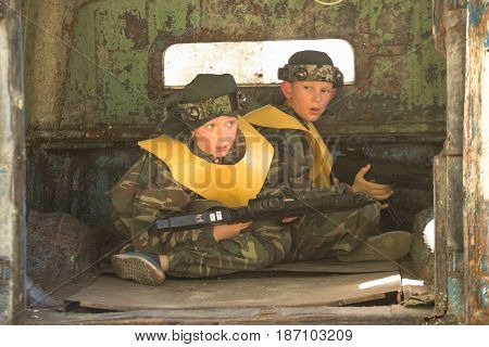 Gomel, Belarus - May 15, 2017: Children And Adults Play The Collective Game Lasertag In The Open Air