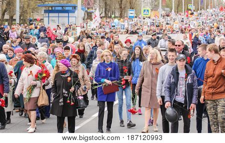 Kirishi, Russia - 9 May, A crowd of people on the stocks immortal regiment, 9 May, 2017.
Preparation and conduct of the action Immortal regiment in small cities of Russia.