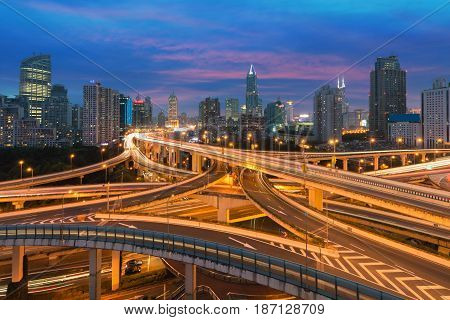 Beautiful Shanghai city with interchange overpass at nightfall in Shanghai China.