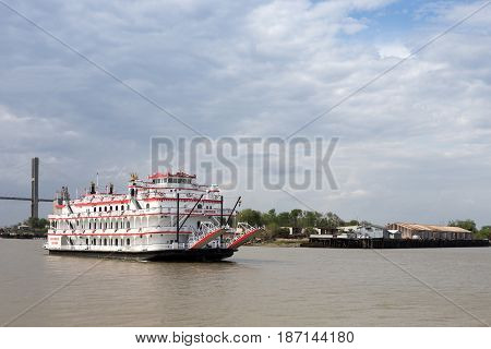 Savannah GA - March 27 2017: The Georgia Queen is an 1800s style paddlewheel riverboat and tourist attraction in historic Savannah Georgia. It can accommodate up to 1000 passengers and is the newest member of the Savannah Riverboat Cruise fleet.
