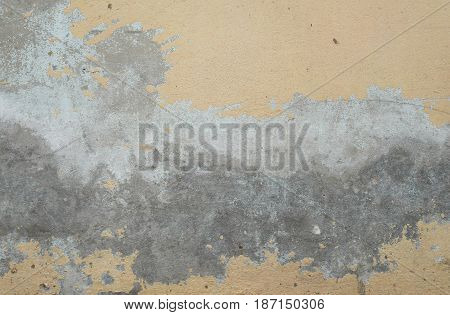 Cocrete wall worn wall damaged old paint. Remains of old paint on the painted concrete surface. Can be us for as background