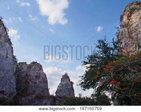 High mountain against blue sky at Khao Ngoo Rock Park or Thueak Khao Ngu Ratchaburi Province Thailand.