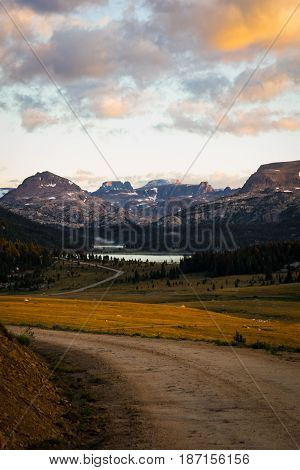 Gravel road and view of mountains Beartooth pass Montana