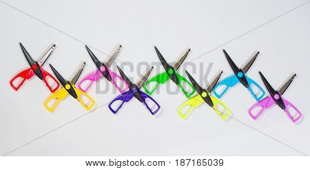 Colorful Scissors in different arrangements and shapes