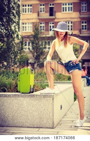 Attractive Woman Tourist With Suitcase Ready To Travel