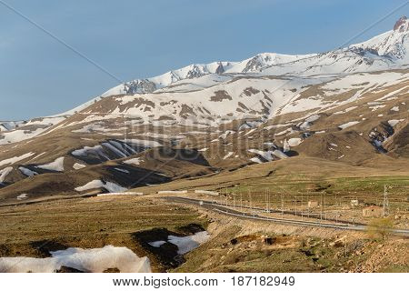 Highway Leading To Erjiyes Ski Resort With Mountain Peak Covered By Snow