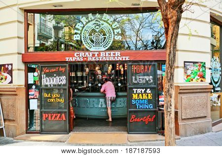 VALENCIA, SPAIN - APRIL 23, 2016: The entrance to the Birra & blues bar, in which passers can refresh the craft ale and beer.Bar is located at Maria Cristina street, 12 (San Fernando) 46002 Valencia