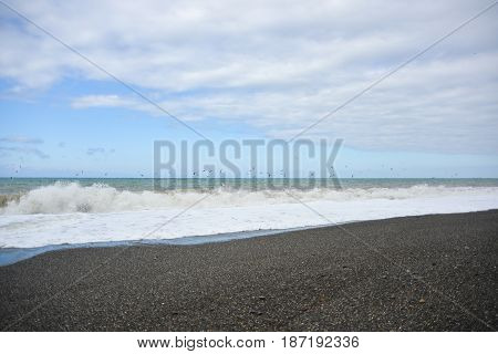 Waves on the pebble beach of the sea during a storm