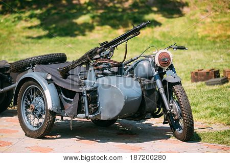 The Old Rarity Blue Tricar, Three-Wheeled Motorbike With The Machine Gun On Sidecar Of Wehrmacht, Armed Forces Of Nazi Germany Of World War 2 Time In Summer Sunny Park.