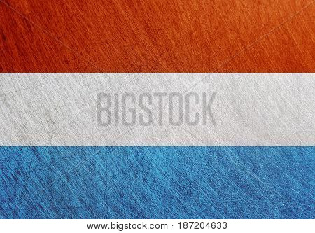 Luxembourg flag vintage retro scratched Steel background.