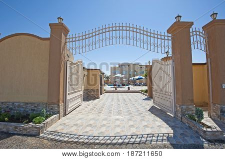 Large Metal Gated Entrance To Luxury Tropical Villa