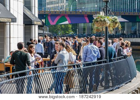 Dockside Bar In Canary Wharf Packed With People Drinking
