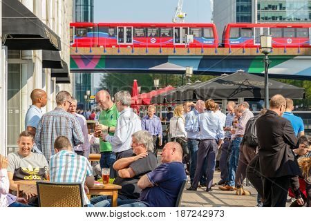Dockside Bar In Canary Wharf Packed With People Drinking