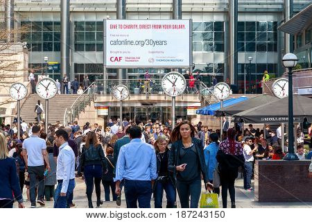 Reuters Plaza In Canary Wharf Packed With Business Men And Women