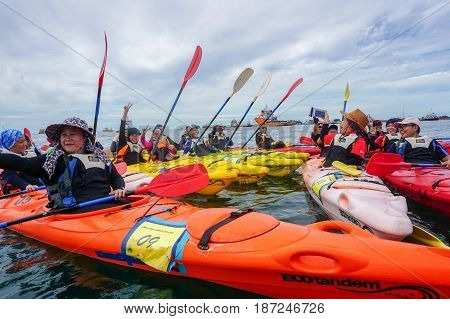 Labuan,Malaysia-Feb 19,2017:Group of adventurer enjoying a weekend kayaking in Labuan island,Malaysia.Malaysia is the ideal place for water sports,like white water rafting,kayaking & scuba diving