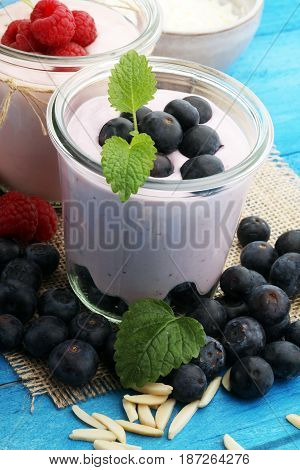 Beautiful Appetizer Pink Raspberries Fruit Smoothie Or Milk Shake In Glass Jar With Berries Backgrou