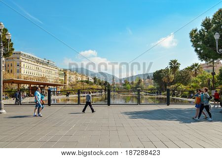 People Walking And Relaxing At Promenade Du Paillon