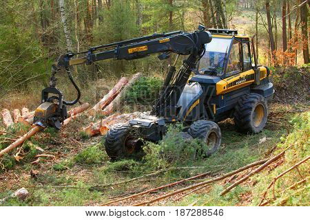 PILSEN CZECH REPUBLIC - APRIL 5, 2017: unidentified lumberjack with modern harvester Ponsse Ergo 6W working in a forest. Forestry is Czech's traditional industry with a very long history. 