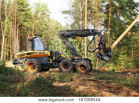 PILSEN CZECH REPUBLIC - APRIL 5, 2017: unidentified lumberjack with modern harvester Ponsse Ergo 6W working in a forest. Forestry is Czech's traditional industry with a very long history. 
