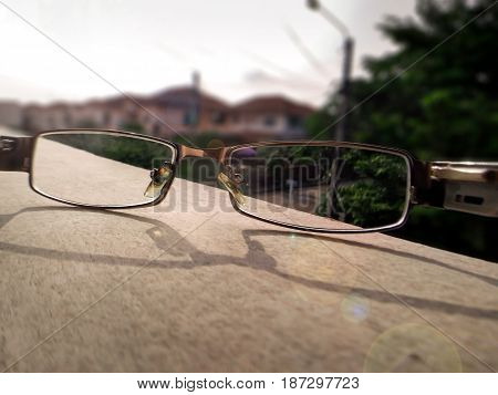 Seeing Through the Lens of a Pair of Glasses on a Sunny Day