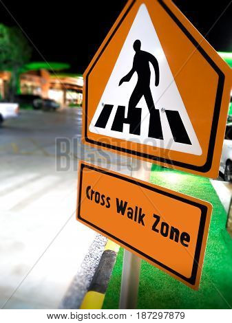 Pedestrian Cross Walk Sign in a Commercial Zone